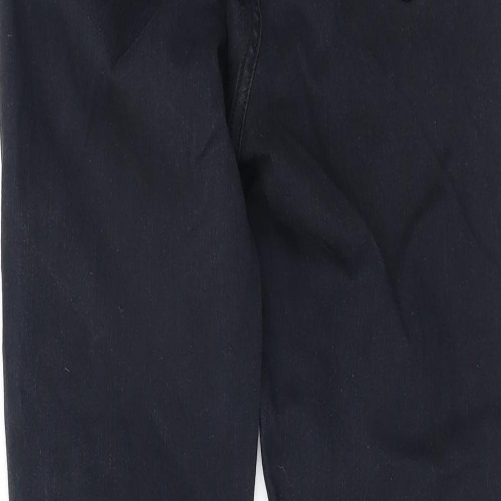 Brand and care label for Topshop women’s black skinny jeans, size UK 26, 32-inch leg