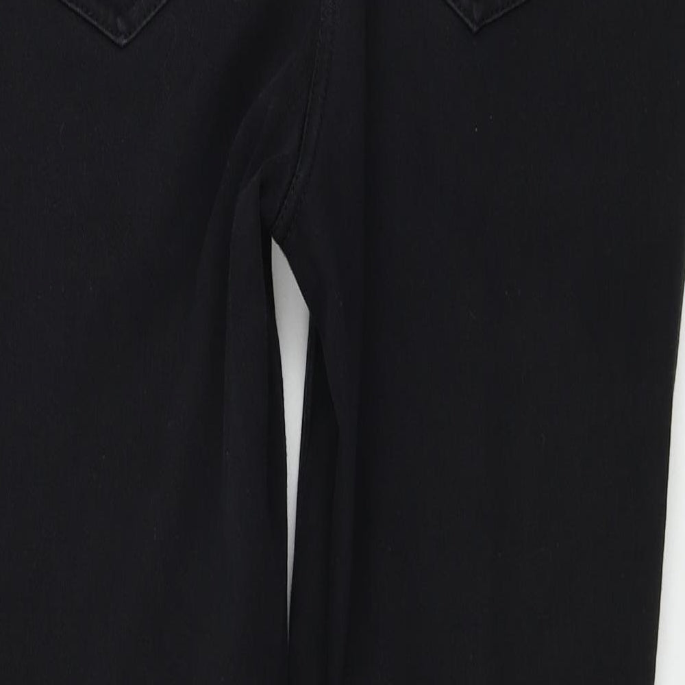 Brand and care label for Next women’s black skinny jeans, size UK 12, 25-inch leg