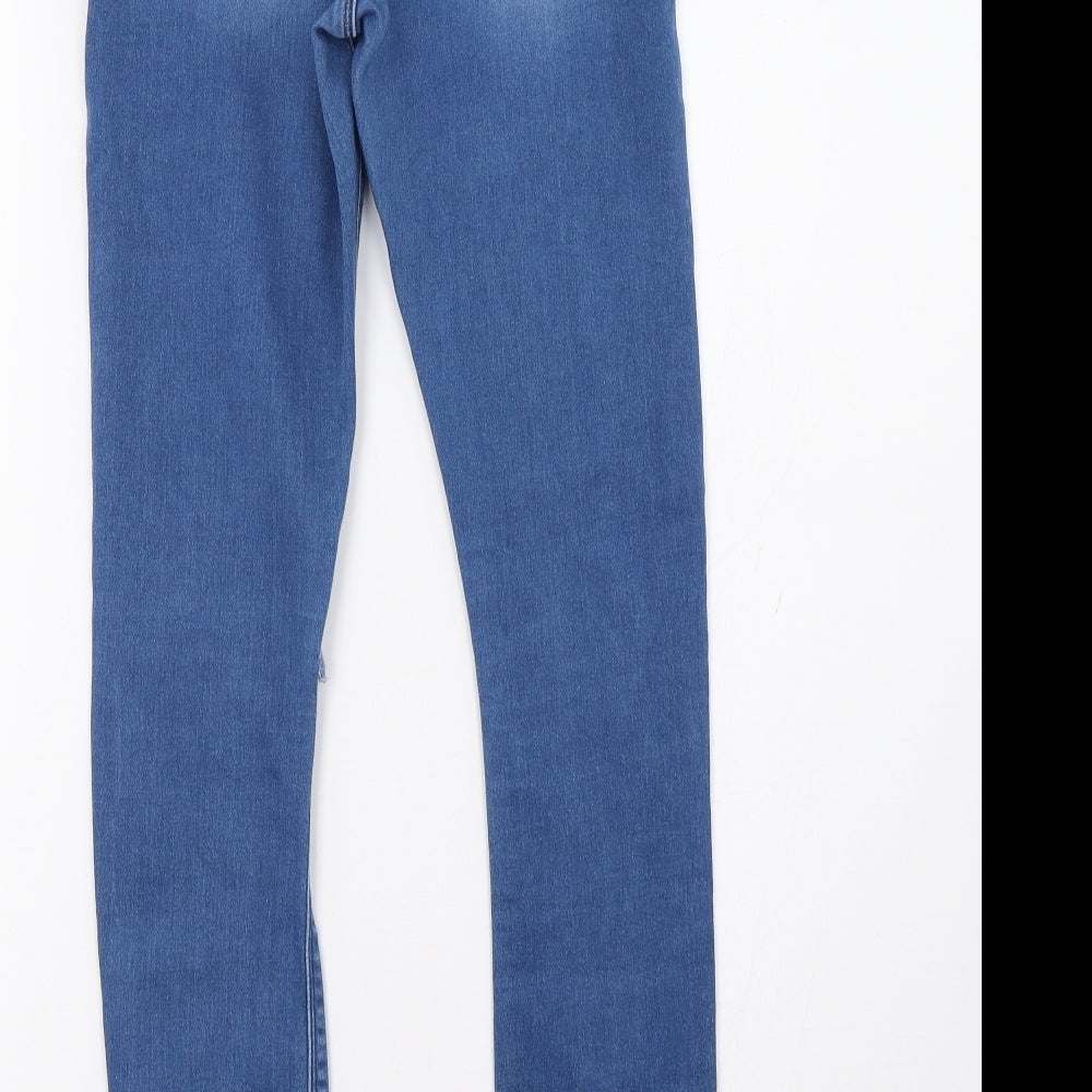Brand and care label for ASOS women’s blue skinny jeans, size UK 26, 32-inch leg