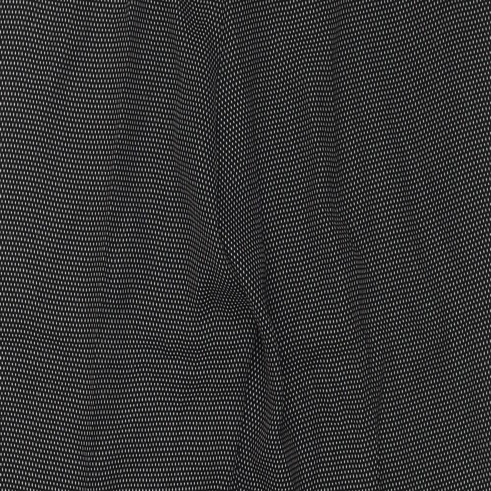 Brand and care label for Gerry Weber women’s black polka dot trousers, size UK 12, 28-inch leg