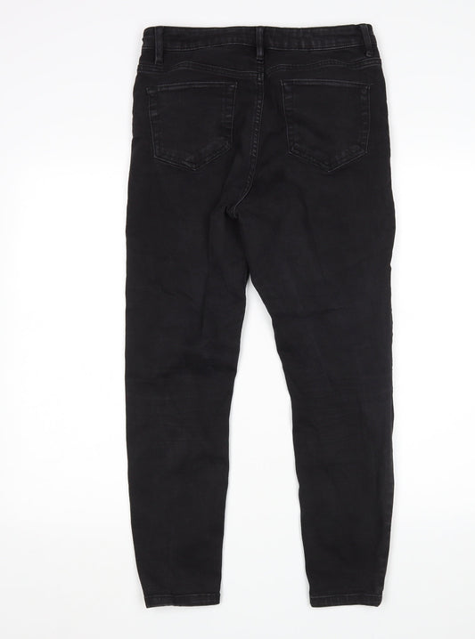 Back view of ASOS women’s black skinny jeans, size UK 30, in, 30-inch leg