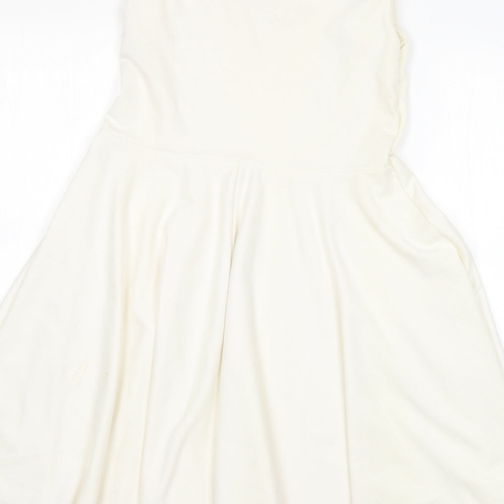 Brand and care label for CAT women’s white a-line, size UK 12