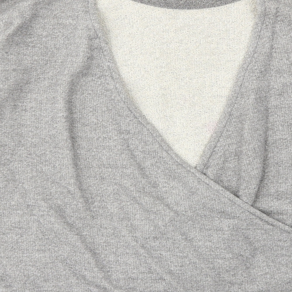 Brand and care label for Light Before Dark women’s grey jumper, size S