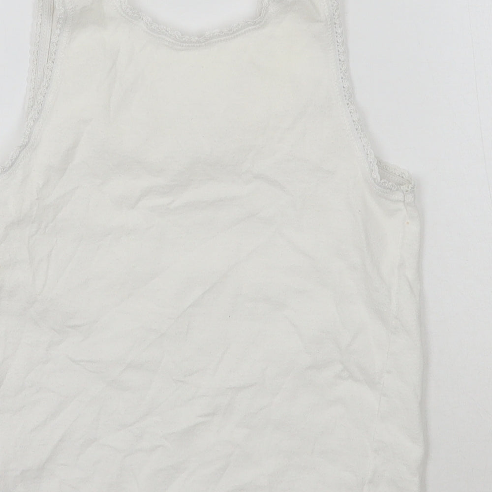 Brand and care label for KidsOwn girls’ white basic tank, size 3-4, years