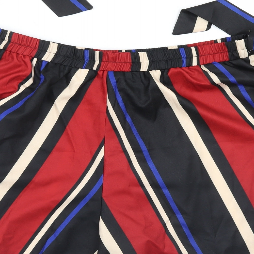 Brand and care label for SHEIN women’s red striped a-line skort, size XL
