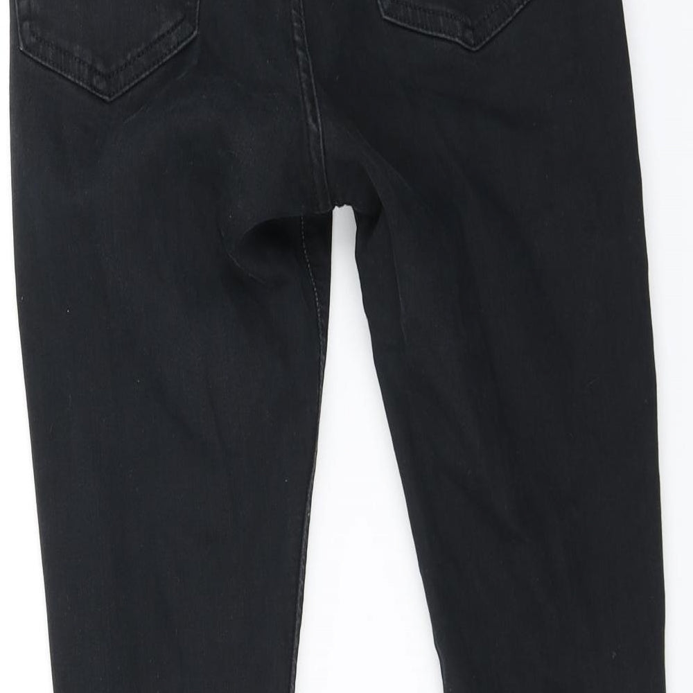 Brand and care label for Topshop women’s black skinny jeans, size UK 30, in, 30-inch leg