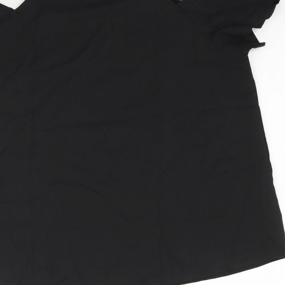 Brand and care label for Avon women’s black basic blouse, size UK 14