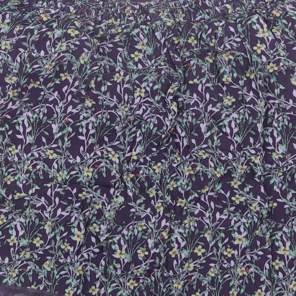 Brand and care label for Marks & Spencer women’s purple floral a-line skirt, size UK 8