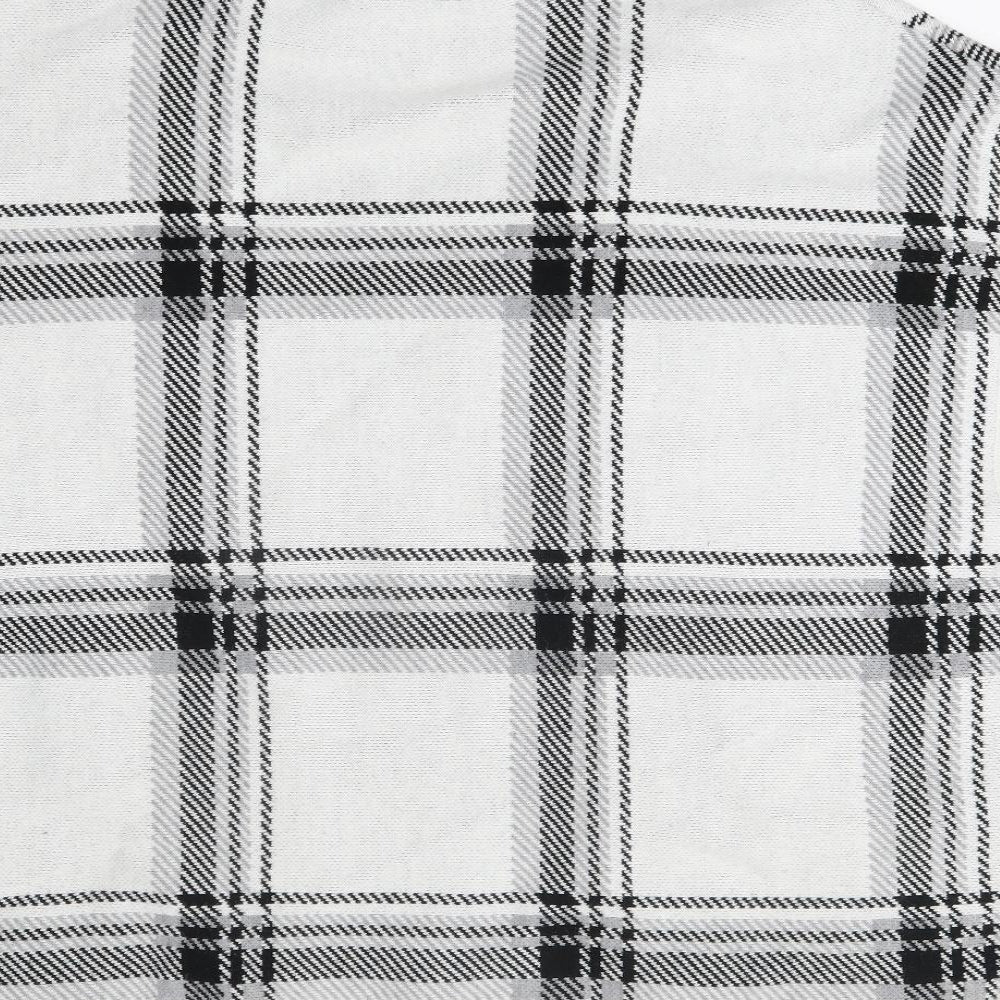 Brand and care label for Nutmeg women’s grey plaid poncho, size UK 12