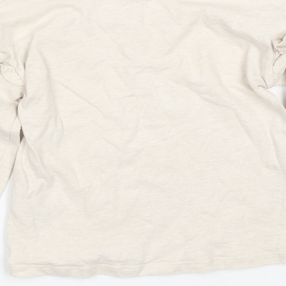 Brand and care label for Tu girls’ beige basic t-shirt, size 5, years - butterfly
