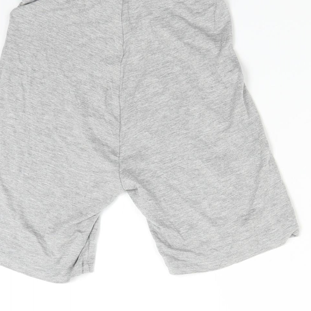 Brand and care label for Missguided women’s grey sweat shorts, size UK 4