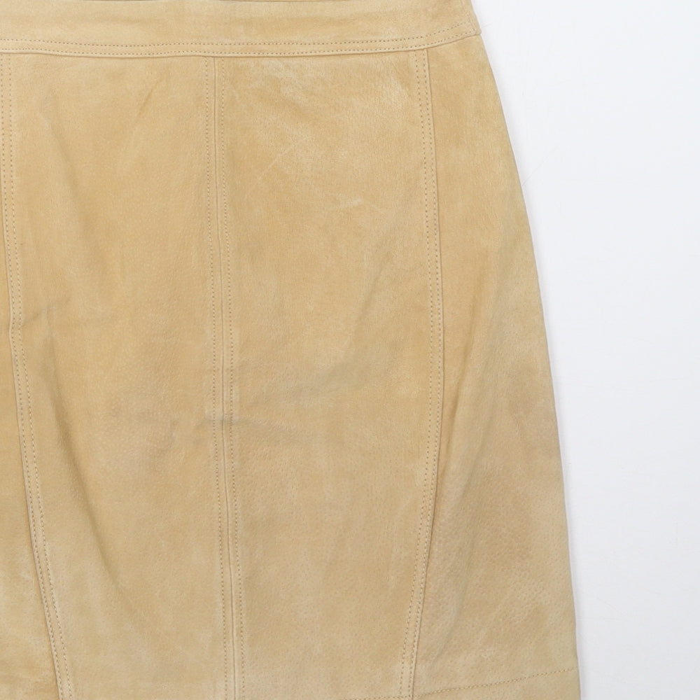 Brand and care label for Mango women’s beige mini skirt, size S