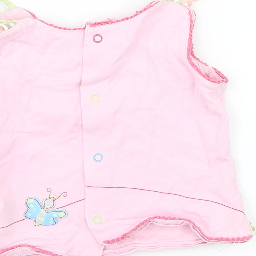 Brand and care label for Yatsi girls’ pink basic tank, size 4, years