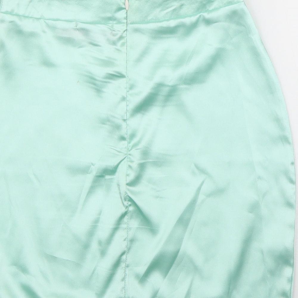 Brand and care label for PRETTYLITTLETHING women’s green a-line skirt, size UK 4