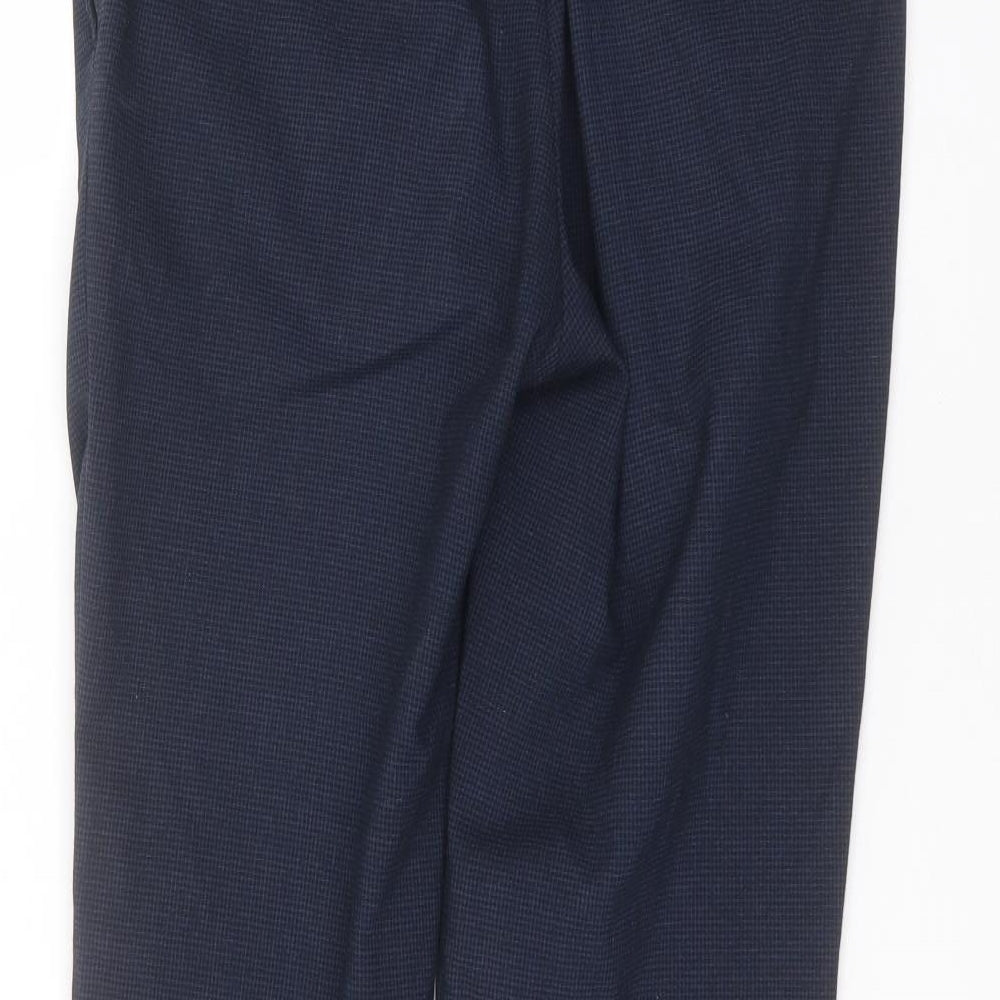 Brand and care label for Burton men’s blue dress pants trousers, size 32, in, 30-inch leg