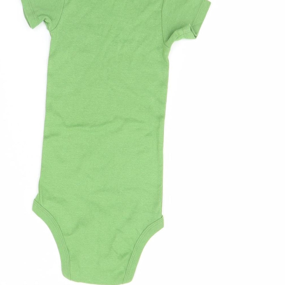 Brand and care label for Carters boys’ green casual, size 2, years