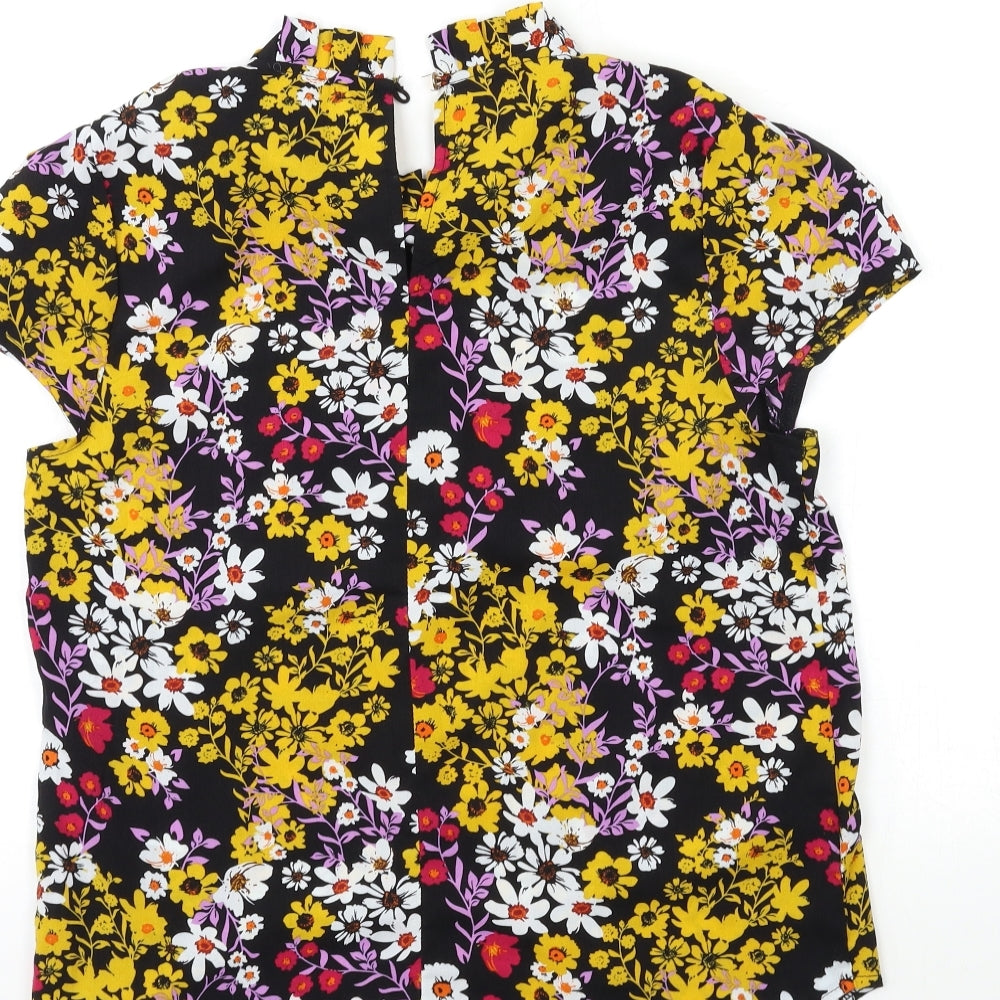 Brand and care label for Apricot women’s black floral basic blouse, size UK 10