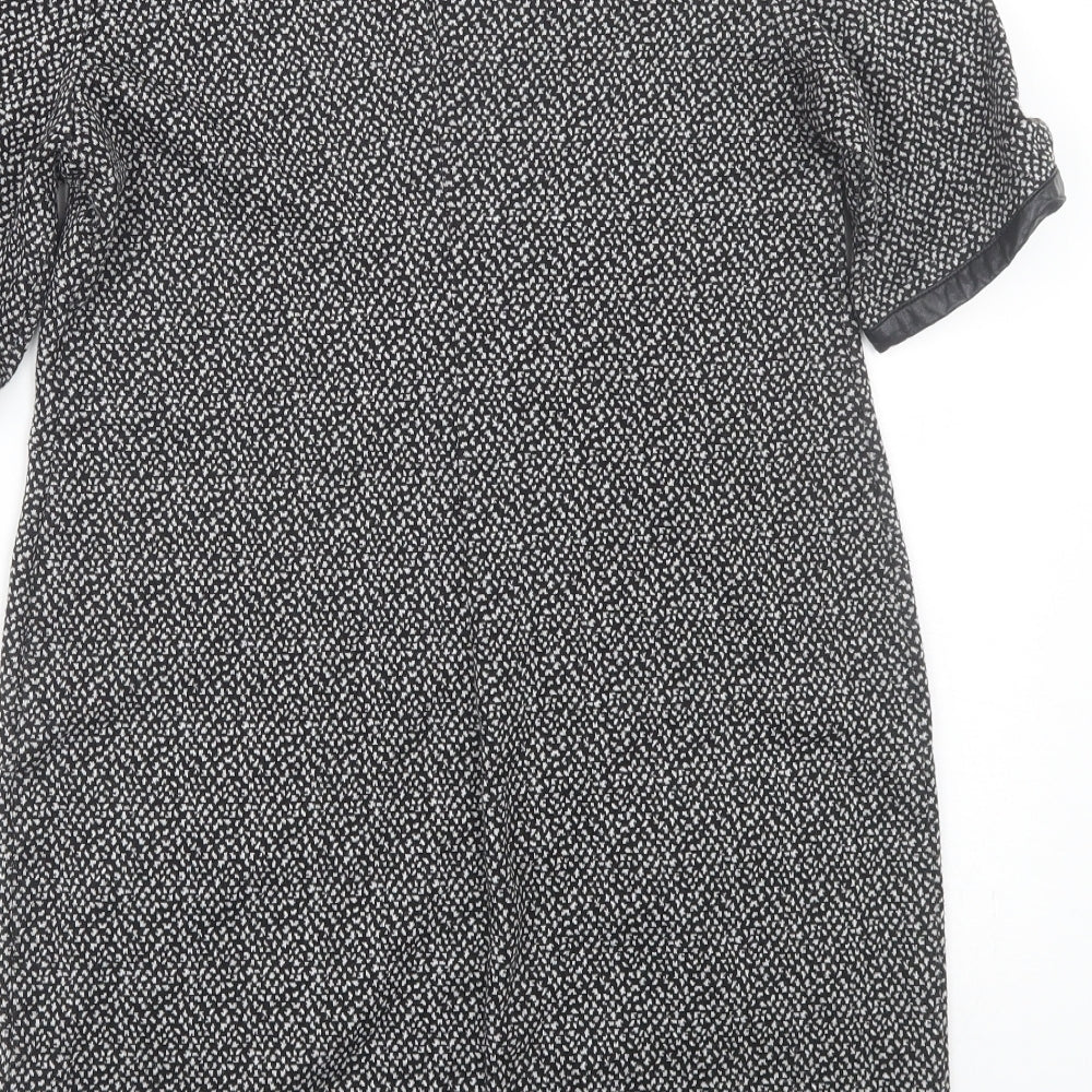 Brand and care label for Dorothy Perkins women’s grey polka dot t-shirt dress, size UK 12