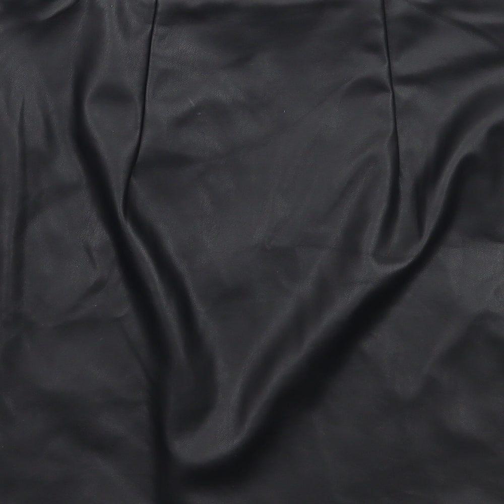 Brand and care label for Primark women’s black a-line skirt, size UK 8