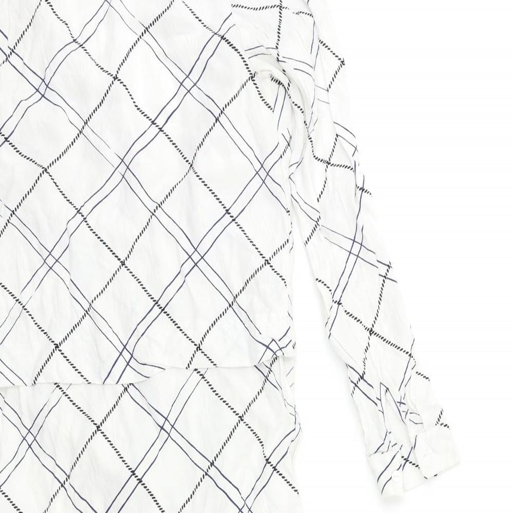 Brand and care label for WAREHHOUSE women’s white check basic blouse, size UK 10