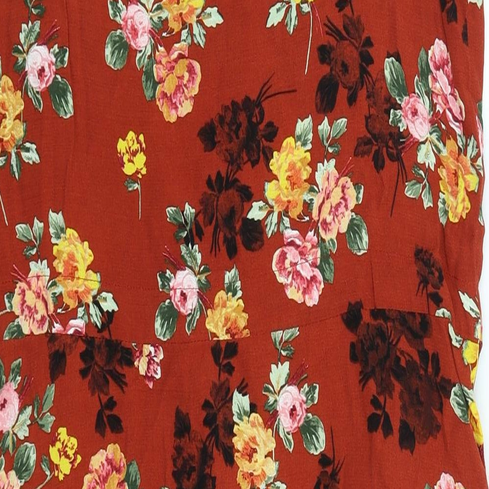 Brand and care label for Blue Chameleon women’s red floral a-line, size UK 12