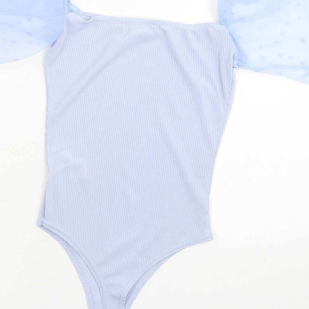 Brand and care label for PRETTYLITTLETHING women’s blue bodysuit one-piece, size UK 6