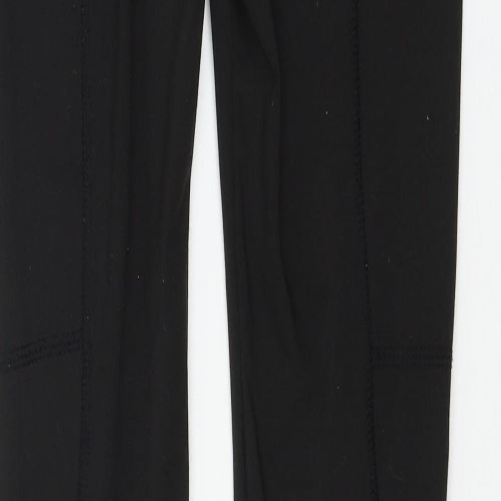 Brand and care label for SHEIN women’s black jersey capri leggings, size XS, 26-inch leg