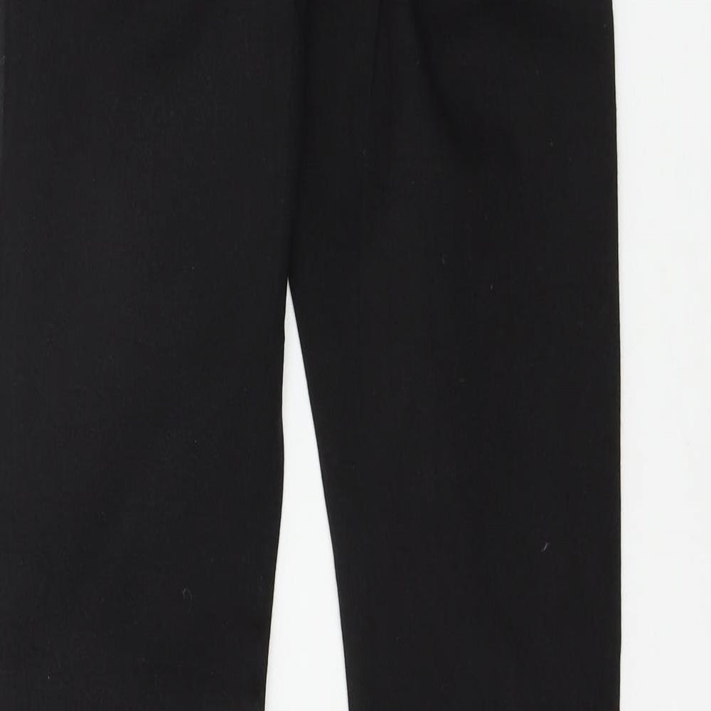 Brand and care label for Divided by H&M women’s black denim skinny jeans, size UK 6, 29-inch leg