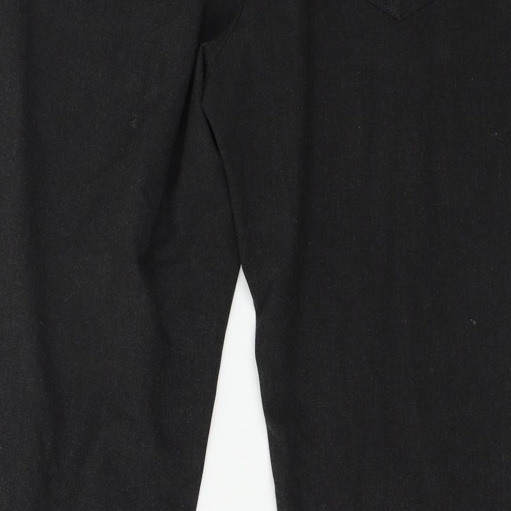 Brand and care label for Marks & Spencer men’s grey trousers, size 36, in, 31-inch leg
