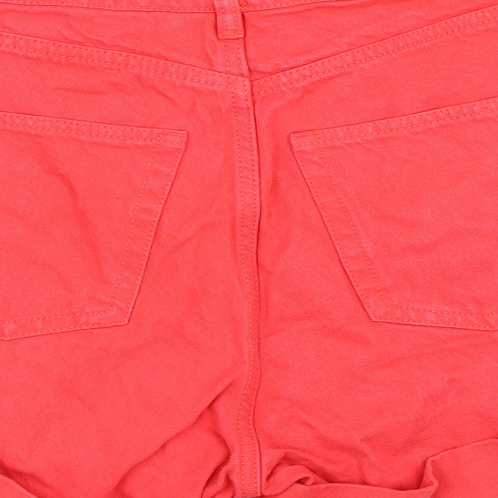 Brand and care label for Monki women’s red mom shorts, size UK 28