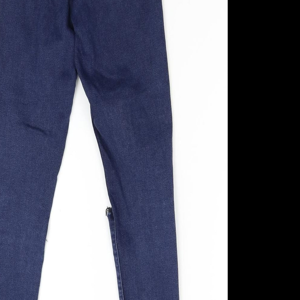 Brand and care label for Topshop women’s blue skinny jeans, size UK 25, 30-inch leg