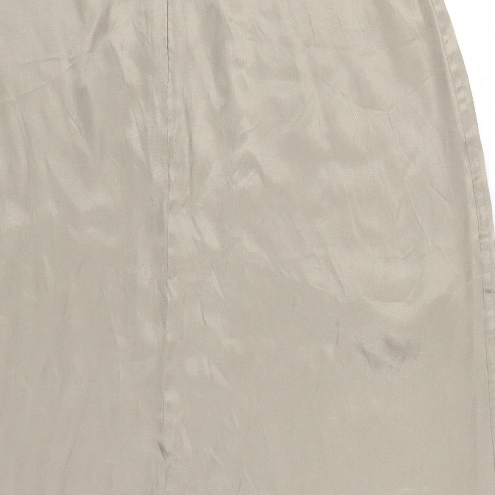 Brand and care label for Marks & Spencer women’s beige straight & pencil skirt, size UK 12