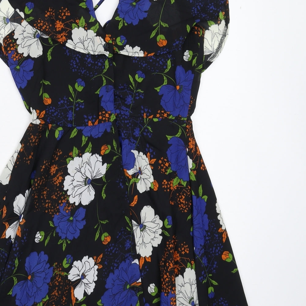 Brand and care label for Boohoo women’s black floral fit & flare, size UK 10