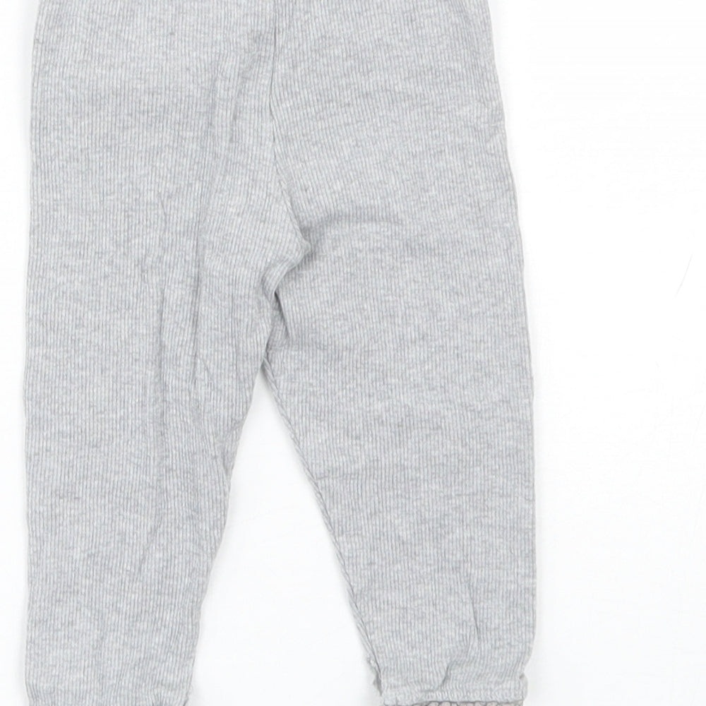 Brand and care label for F&F Baby Grey Capri Trousers, size 6-9, Months