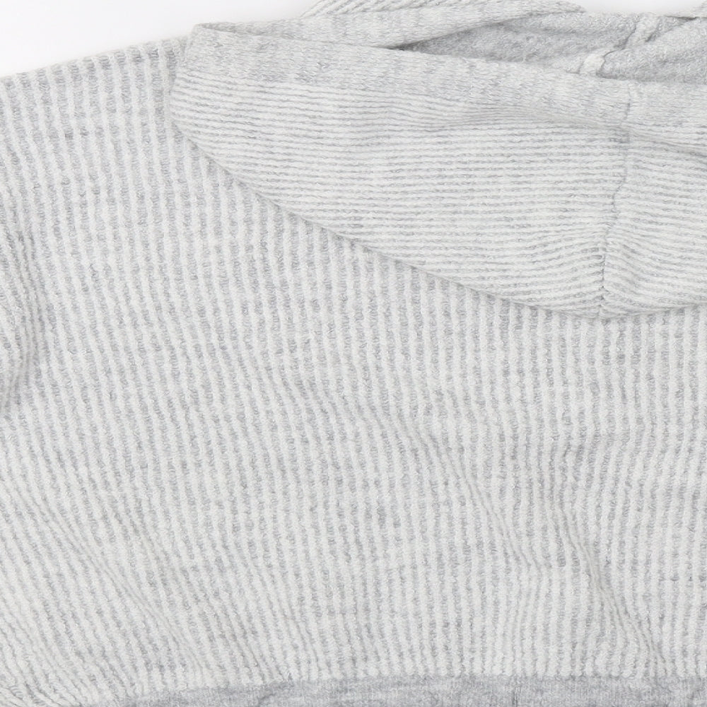 Brand and care label for Primark women’s green pullover hoodie, size M