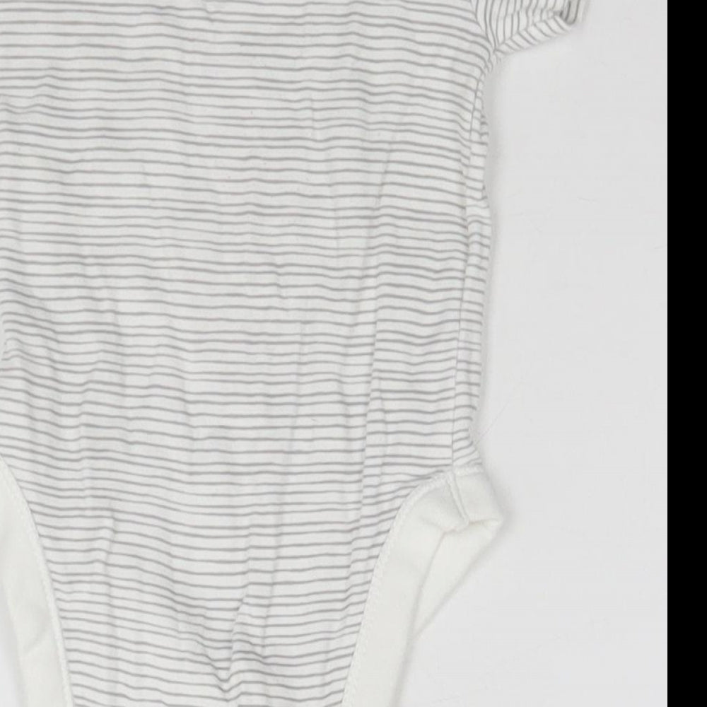 Brand and care label for Disney Baby Green Striped Leotard One-Piece, size 0-3, Months