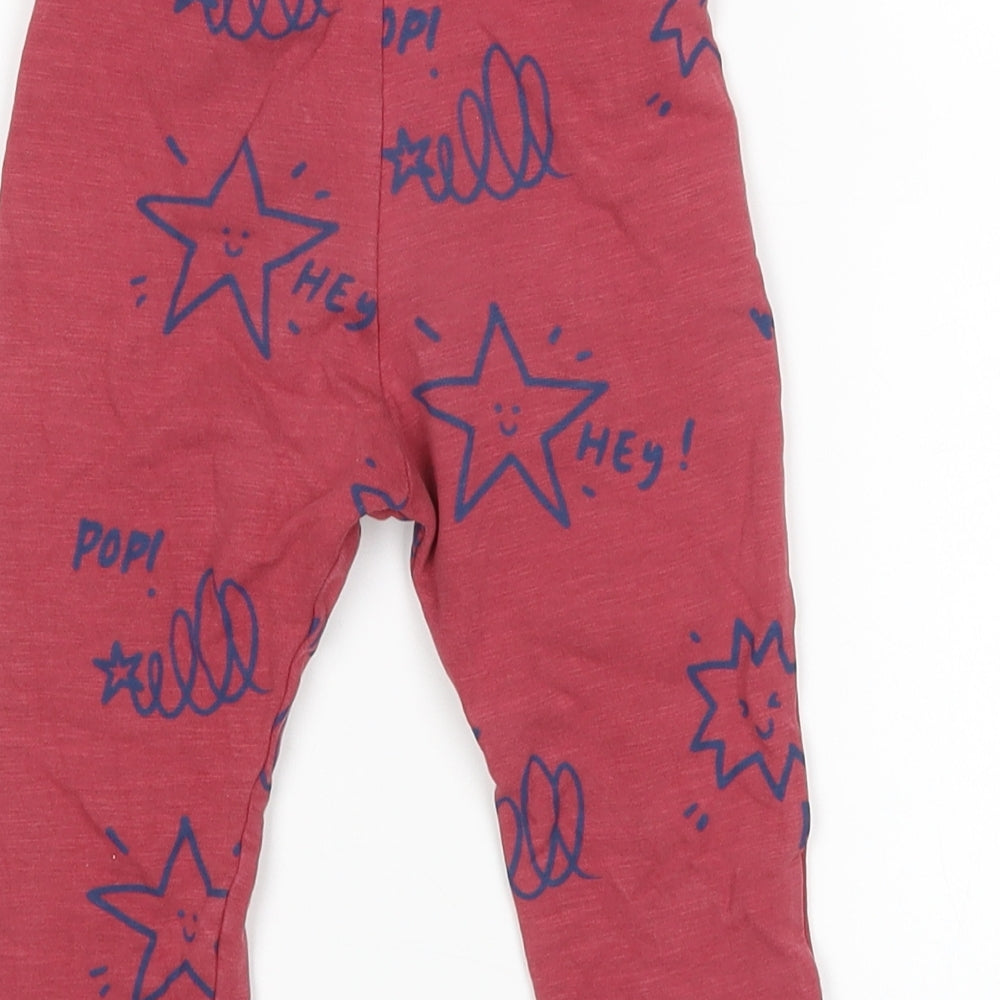 Brand and care label for Marks & Spencer Baby Purple sweatpants, size 9-12, Months