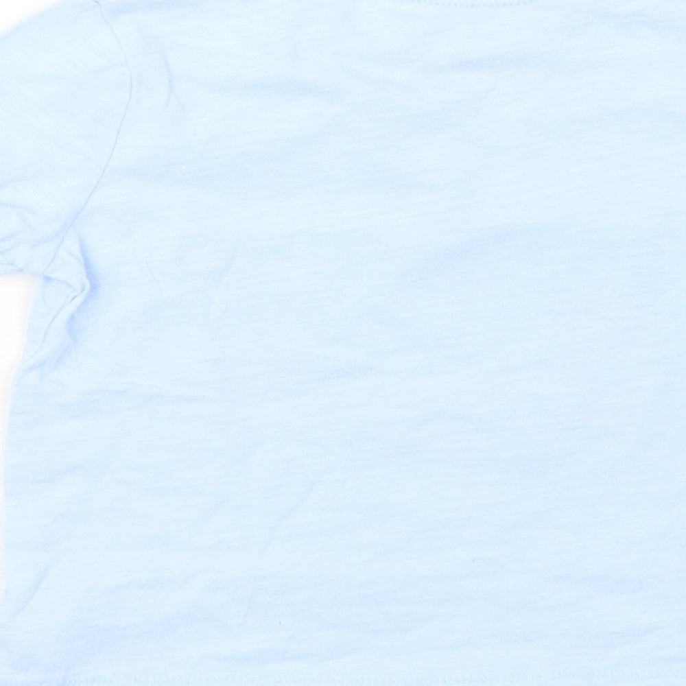 Brand and care label for Gap girls’ blue basic t-shirt, size 18-24, months