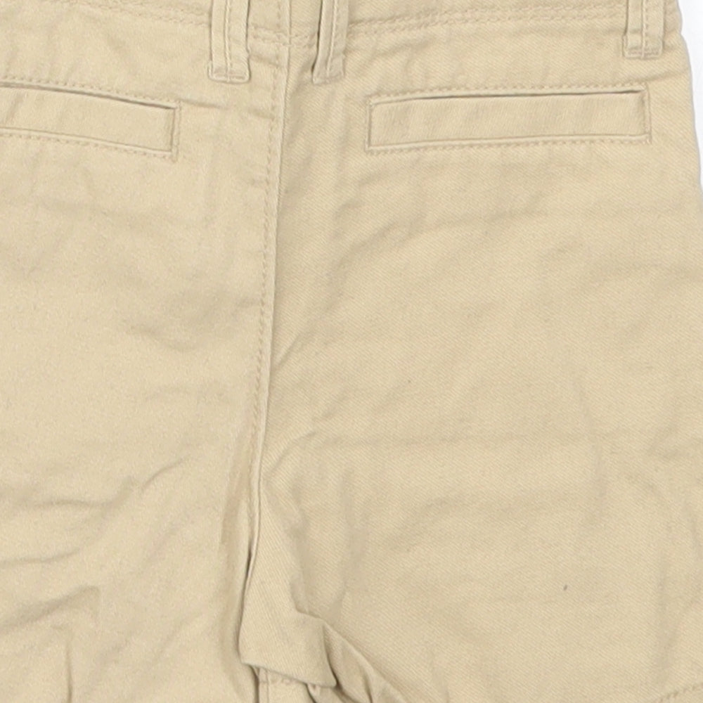 Brand and care label for Gap boys’ beige cropped trousers, size 12-18, months