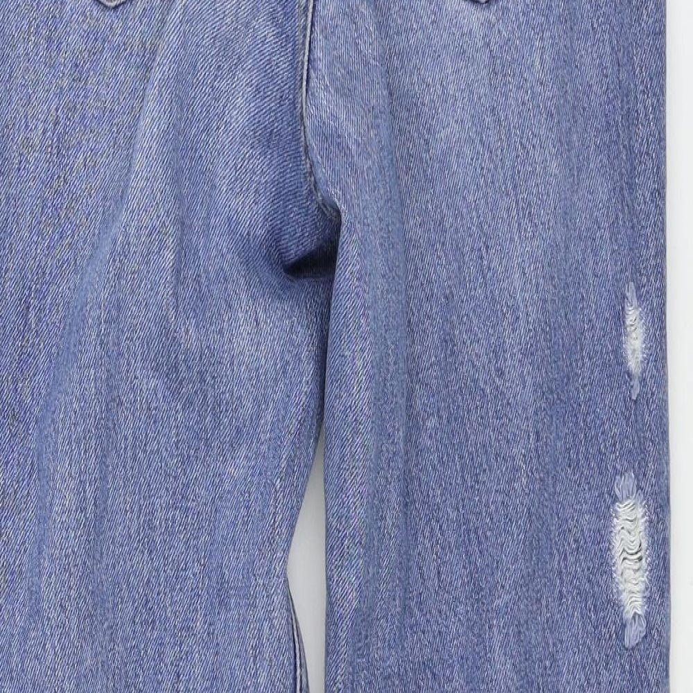 Brand and care label for Topshop women’s blue denim mom jeans, size UK 25, in, 32-inch leg