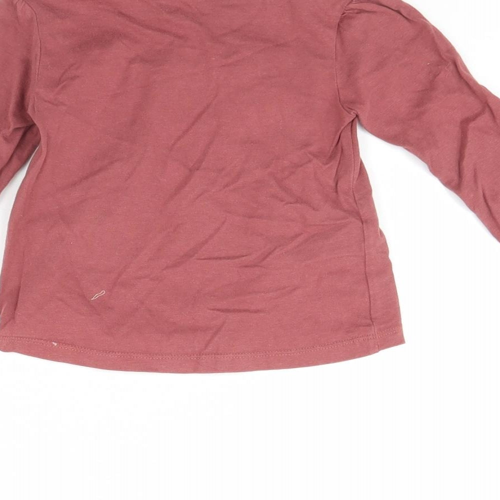 Brand and care label for Tu girls’ red basic t-shirt, size 12, months