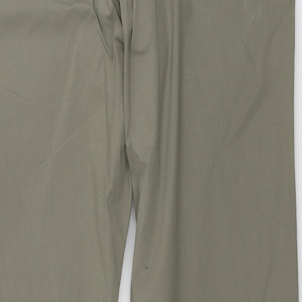 Brand and care label for Marks & Spencer men’s beige trousers, size 34, in, 33-inch leg