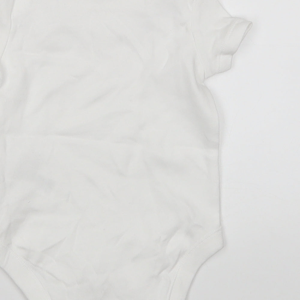 Brand and care label for F&F Baby White Leotard One-Piece, size 3-6, Months
