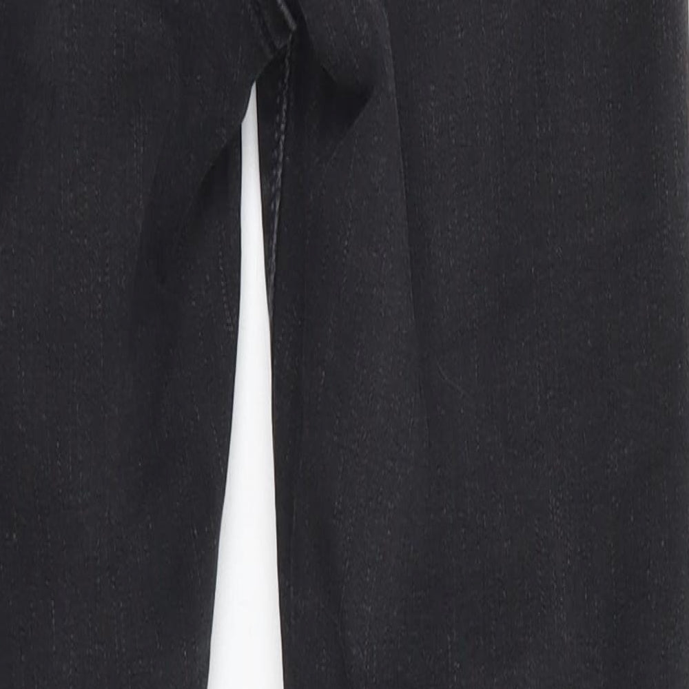 Brand and care label for Topshop women’s black skinny jeans, size UK 26, in, 26-inch leg