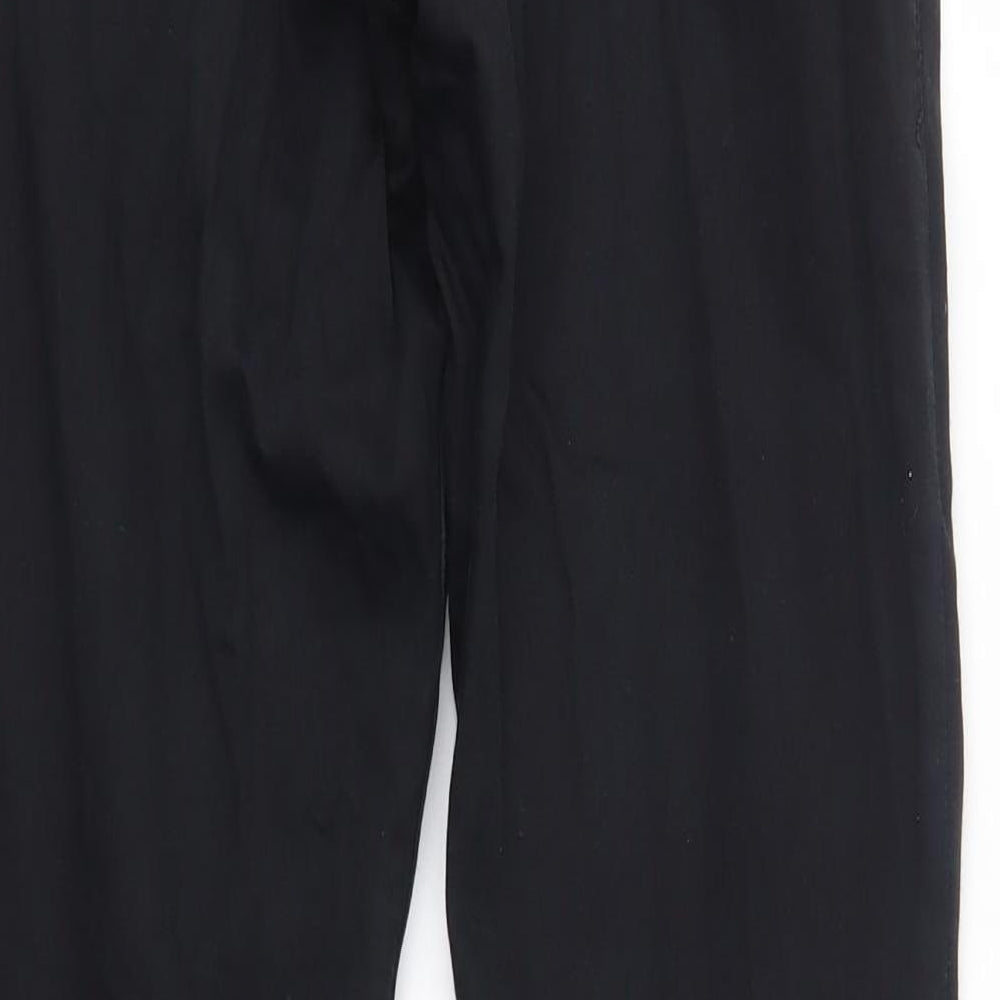 Brand and care label for Topshop women’s black skinny jeans, size UK 26, 30-inch leg