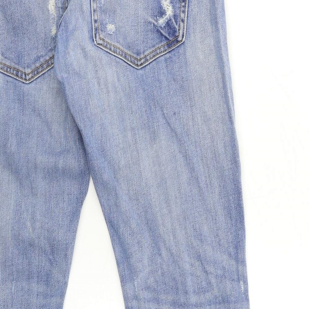 Brand and care label for Zara women’s blue denim mom jeans, size UK 4, 27-inch leg