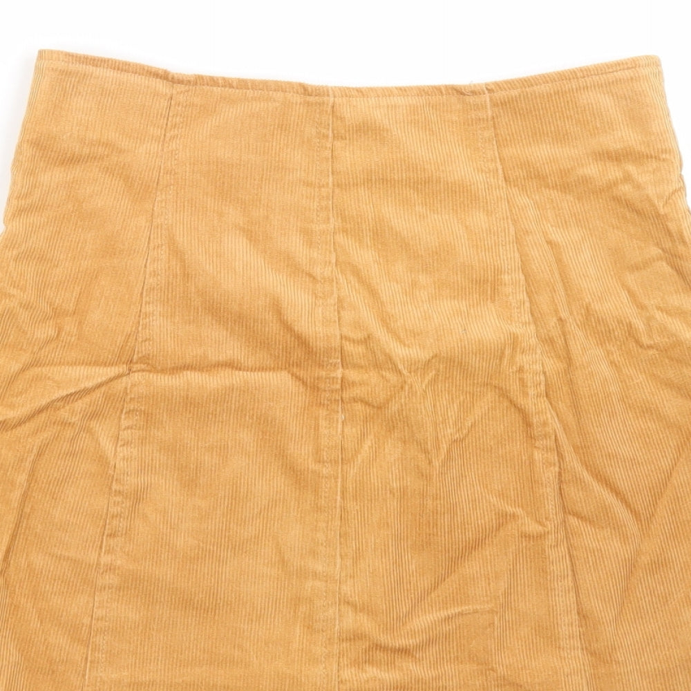 Brand and care label for Glamorous women’s beige corduroy a-line skirt, size XS