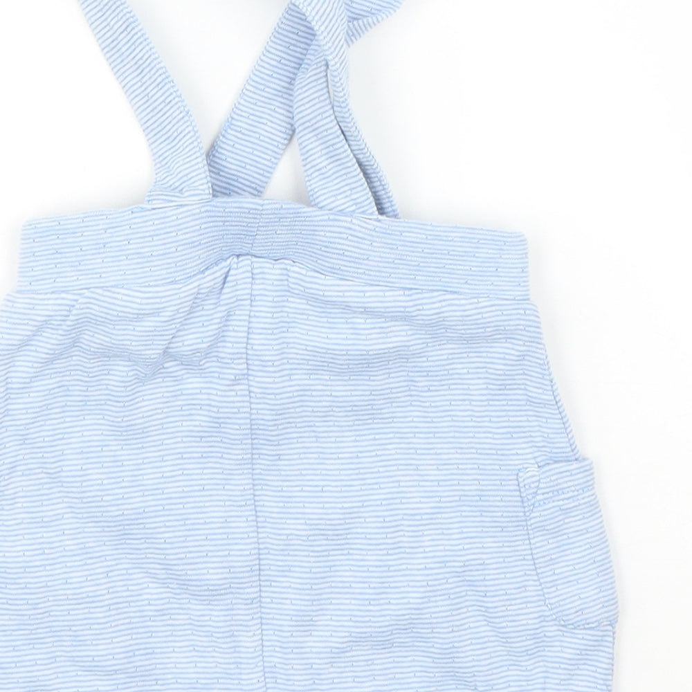 Brand and care label for Nutmeg boys’ blue striped dungaree one-piece, size 3-6, months