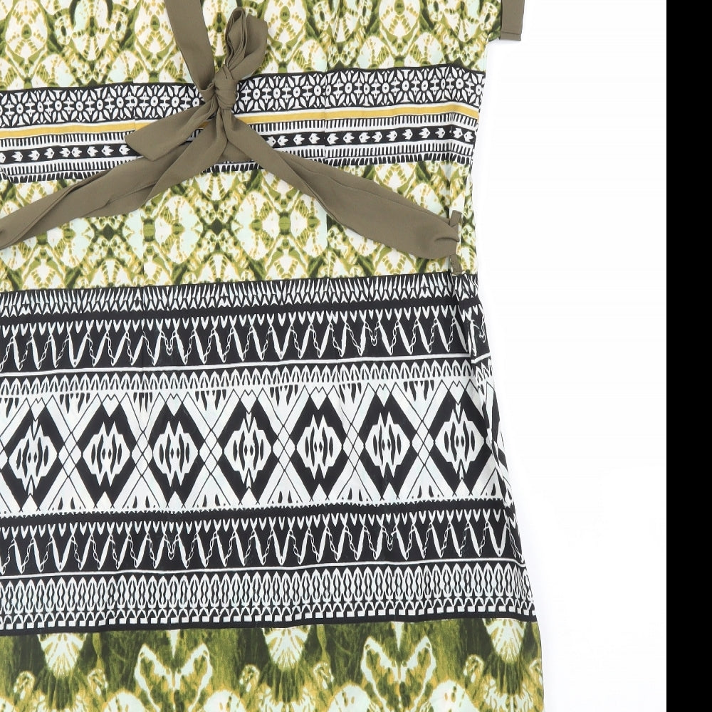 Brand and care label for Encuento women’s green batik a-line, size M