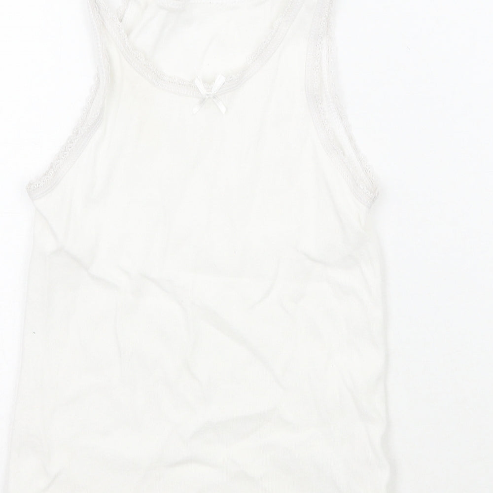Brand and care label for Matalan girls’ white basic tank, size 4-5, years